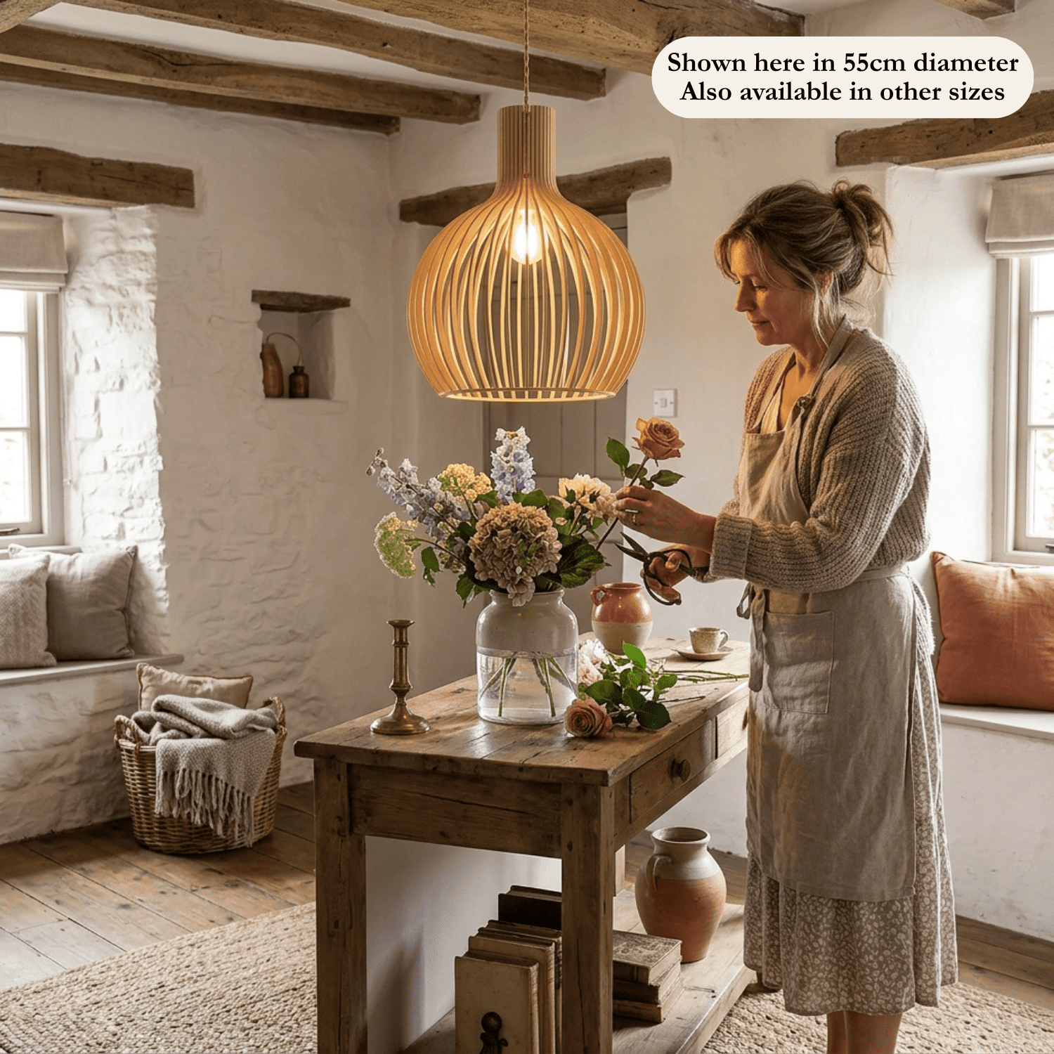 Aspen wooden lampshade in a bright room with a woman cutting flowers