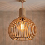 Aspen wooden lampshade lit, casting a soft striped glow