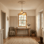 Elva wicker lampshade hanging in the hall in a calm British entrance