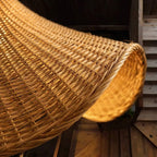 Close up of the fine handwoven wicker and wooden collar on the Elva lampshade