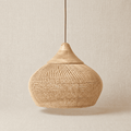 Mira handwoven wicker pendant lampshade on a neutral background