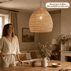Sena wicker lampshade in 50cm shown above a dining table in a British home